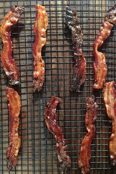 bacon drying on rack